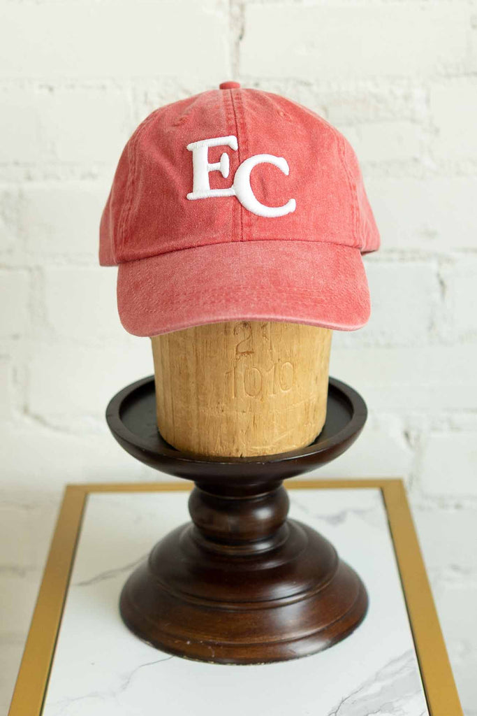 EC baseball cap, washed red hat, small town pride hat, Adams brand cap, embroidered hometown hat, leather strapback hat, mesh liner hat, summer boutique hat, EL CAMPO Texas cap, vintage faded cap, breathable game day hat, adjustable red ball cap