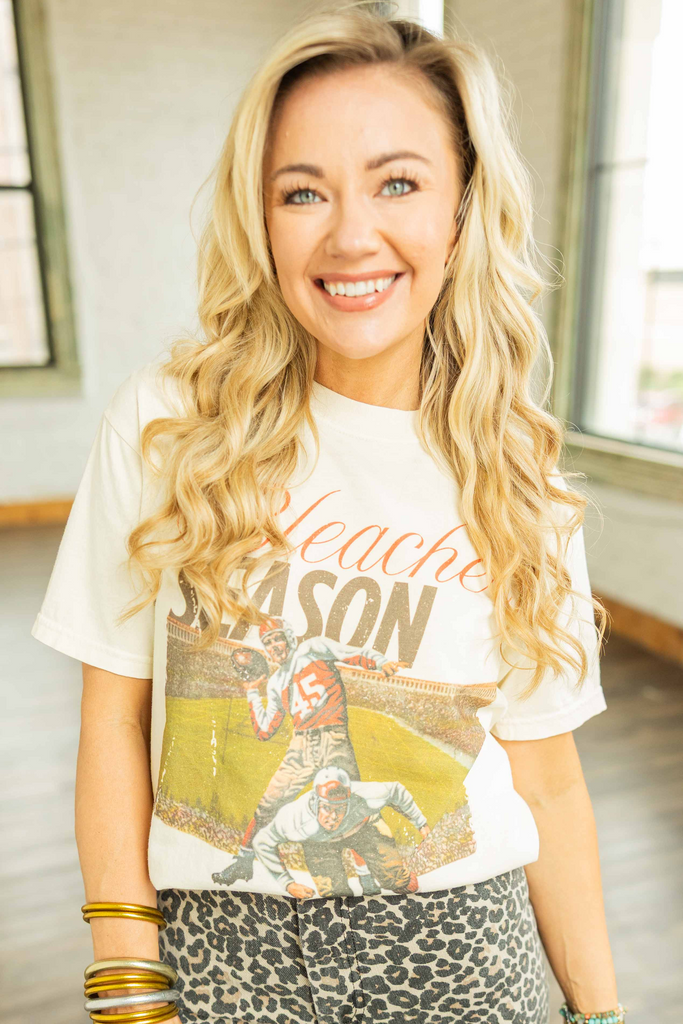 bleacher season tee, comfort colors graphic tee, vintage football shirt, game day t-shirt, plus size game day outfit, cotton football tee, relaxed fit game day shirt, bleacher style tee, heavyweight comfort colors tee, fall football outfit idea, retro sports tee, plus size cotton t-shirt, game day ready top, cute football outfit, ivory cotton graphic tee