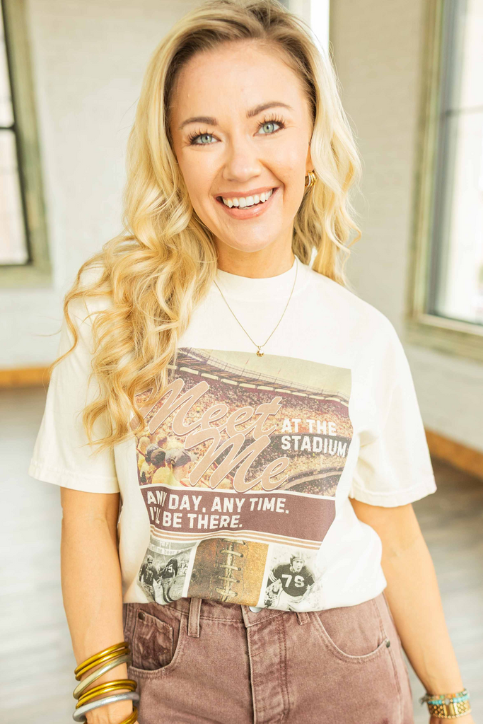 meet me at the stadium shirt, vintage football tee, comfort colors football shirt, 100% cotton game day tee, relaxed fit graphic tee, plus size tailgate outfit, retro sports fan shirt, heavyweight cotton tee, ivory game day t-shirt, football stadium graphic top, game day style, fall football fashion, plus size comfort colors tee, nostalgic football shirt, tailgate season tee