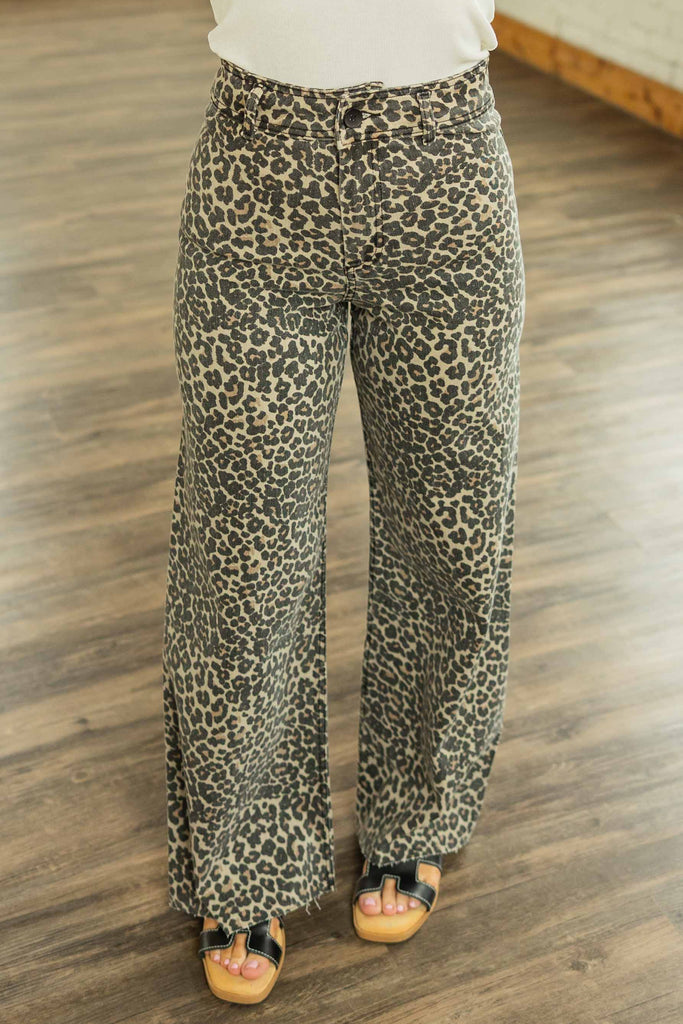 leopard print jeans, wide leg leopard pants, printed denim, animal print bottoms, high rise leopard jeans, raw hem denim, fall trend jeans, cotton spandex jeans, boutique leopard jeans, statement denim