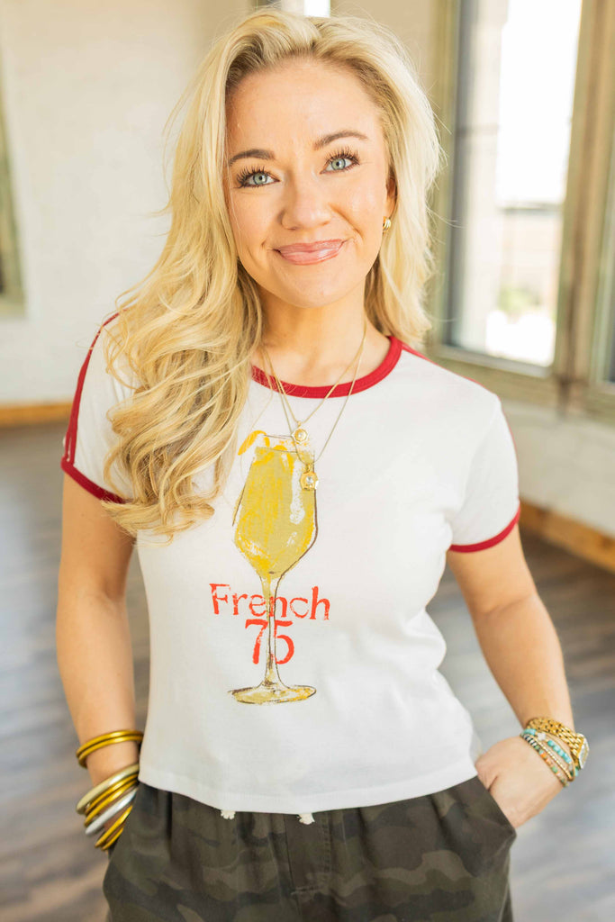 cropped cocktail graphic tee, French 75 t-shirt, Girl Dangerous baby tee, white ribbed cotton tee, vintage sporty tee, contrast trim tee, retro cropped shirt, brunch outfit top, soft stretchy baby tee, cocktail themed graphic shirt
