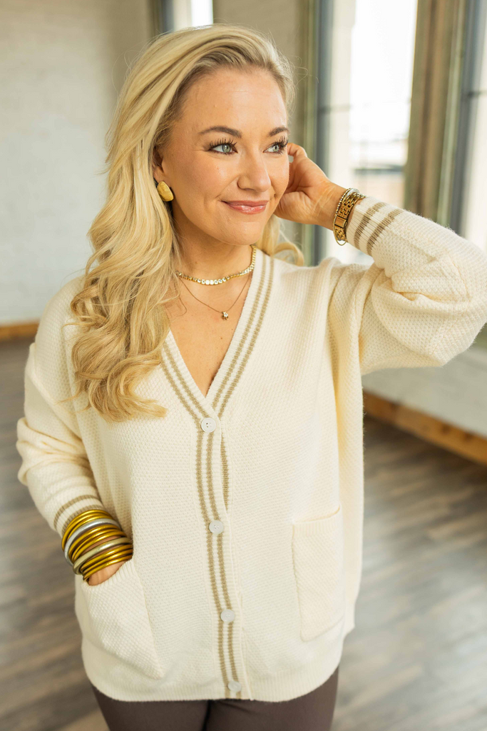 cream cardigan, oversized button down cardigan, cozy fall cardigan, neutral cardigan with pockets, cotton knit cardigan, lightweight layering cardigan, casual cream sweater, back to school cardigan, everyday neutral knit, boutique cardigan Texas