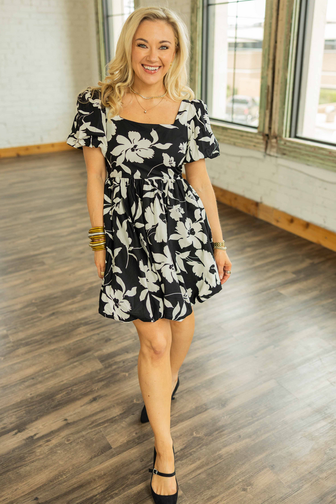 baby doll floral dress, black and white floral mini dress, puff sleeve dress, bubble hem dress, cotton floral dress, southern boutique dresses, date night outfit ideas, black and white baby doll dress, smocked back mini dress, floral party dress