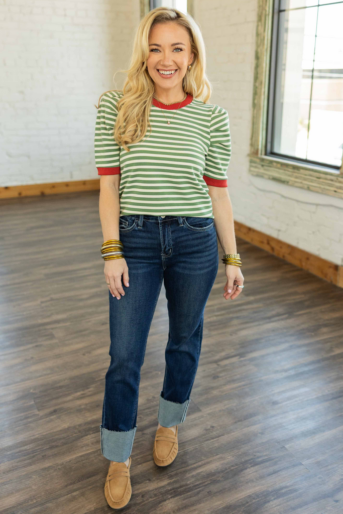 Woman wearing [LOVERET] Gracelyn High Rise Cuff Slim Straight Jeans in dark wash with 4-inch cuff