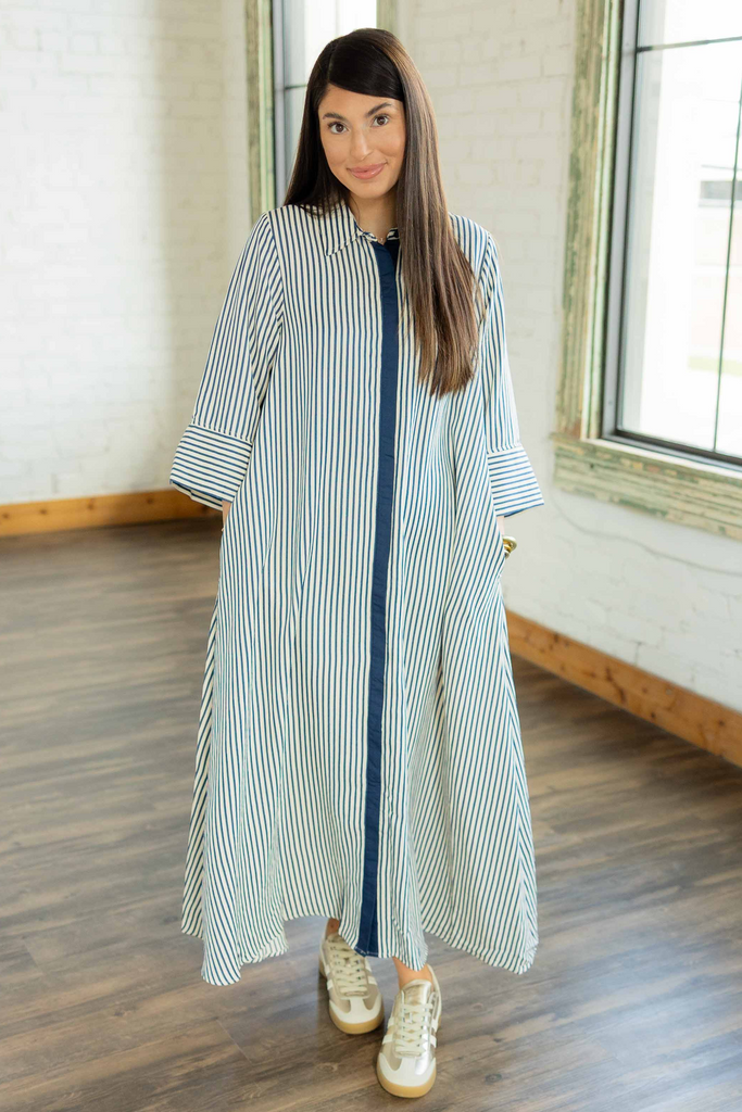  Emelia blue and white striped long sleeve caftan maxi dress with navy contrast placket and sneakers 