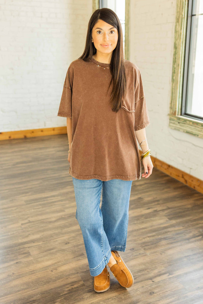 Kayla wearing the Natalia brown mineral washed oversized tee with drop shoulder and faux pocket detail
