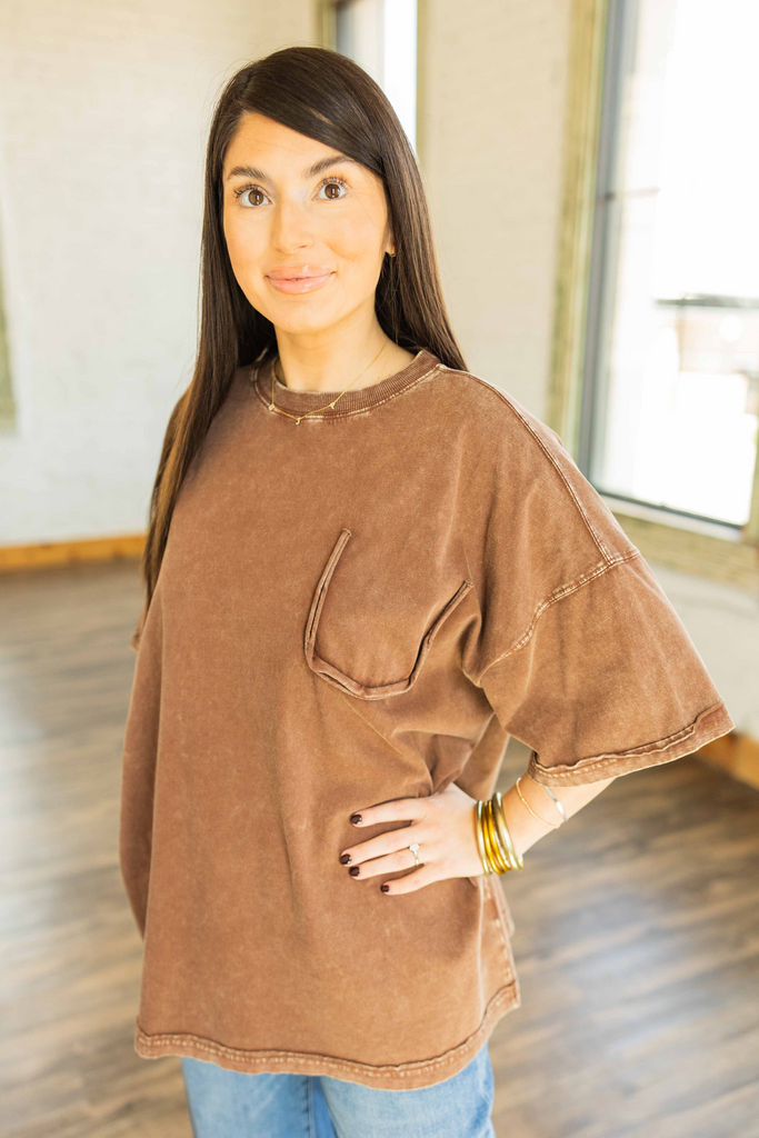 Kayla wearing the Natalia brown mineral washed oversized tee with drop shoulder and faux pocket detail